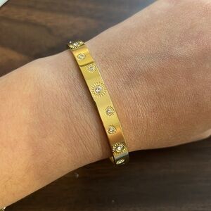 Gold plated stainless steel sun bangle bracelet